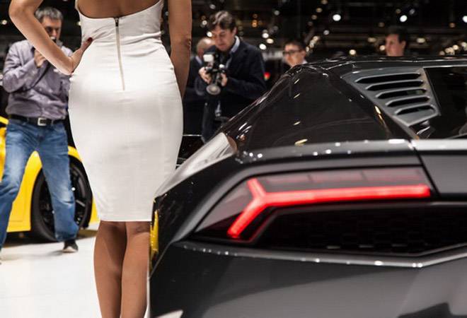 Why every big car launch has a woman next to the vehicle